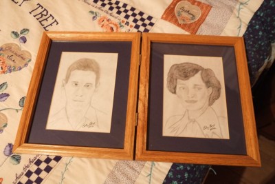 . . . such as these portraits my sister-in-law Betsy drew of my parents and the family tree quilt I made for Mother and Daddy, lying on the bed that was once in my grandparents' home.