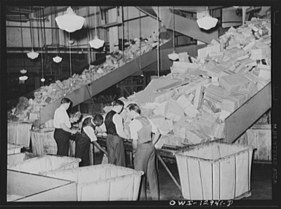 Postal Workers Handle Packages in 1938; Courtesy Library of Congress