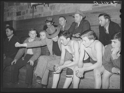 A high school basketball coach instructs a player in Eufaula, Oklahoma in 1940. Courtesy Library of Congress