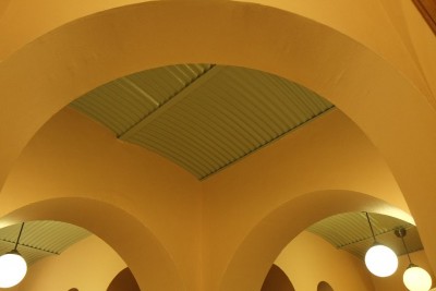 Metal ceiling with arches.
