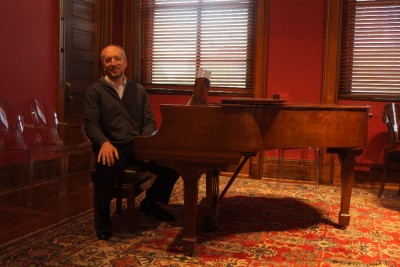 John with Arthur Rubenstein's Piano