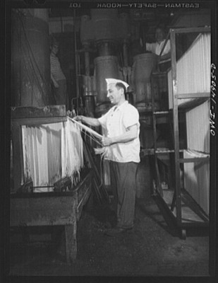 Spaghetti Long Island City, New York. Atlantic Macaroni Company, makers of Caruso brand products. Workers hanging out spaghetti to dry