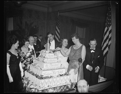 First Lady Eleanor Roosevelt cuts her husband's birthday cake in 1939. Photo courtesy Library of Congress.