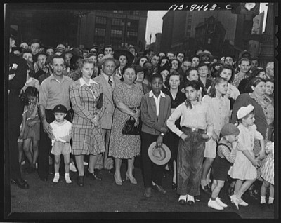 Worker's wives and children watch a Labor Day parade in Detroit, Michigan, 1942. Photo Courtesy Library of Congress
