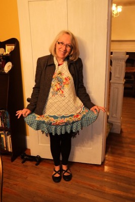 As usual, I thought of you, so I put my apron and coat back on when I got home and asked Ray to take my picture. Yes, this technology immigrant walked into a Verizon store full of natives in this get-up! Oh, me, what am I going to do with me??