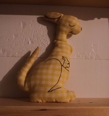 This gingham kangaroo from our children's childhood is a favorite with our grandchildren.
