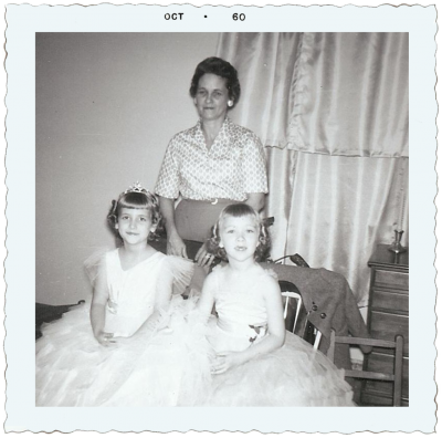 Seated at left is my Aunt Emily, who is only 18 months older than I and who was also in the contest. I am sitting beside her and my Daddy's mother, whom we called Mama Sue, stands behind is her dining room.