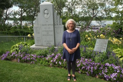 Standing by Jeanne Crevair Boucher's Monument