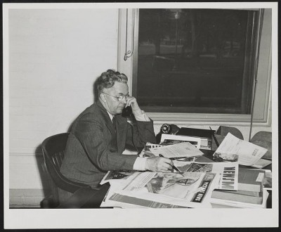  Roy Emerson Stryker, half-length portrait, seated at desk, talking on the telephone, c. 1942. Courtesy Library of Congress.